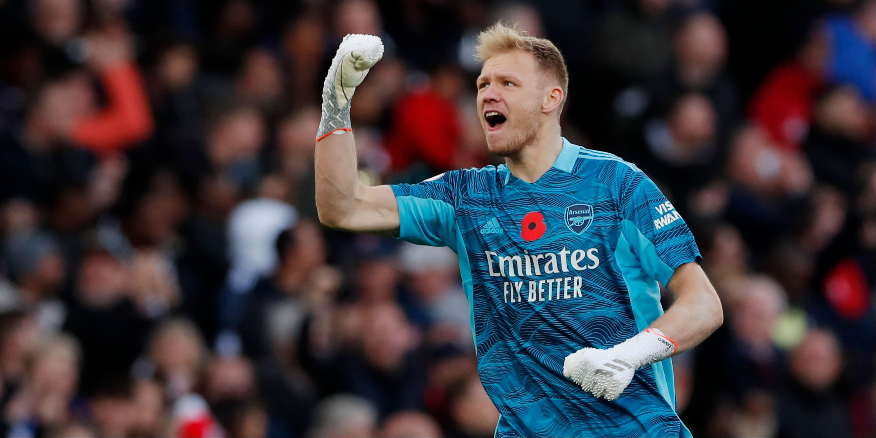 Arsenal's Aaron Ramsdale celebrates a victory. 