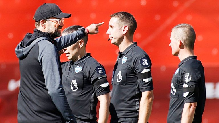 Liverpool manager Juergen Klopp speaks with referee David Coote in 2020.
Pic: PA