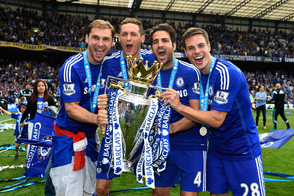 (L-R) Branislav Ivanovic, Nemanja Matic, Cesc Fabregas and Cesar Azpilicueta of Chelsea celebrate with the trophy after the Barclays Premier League match between Chelsea and Sunderland at Stamford Bridge on May 24, 2015 in London, England. Chelsea were crowned Premier League champions. (Photo by Mike Hewitt/Getty Images)